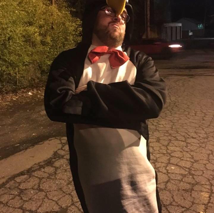 Jared in a penguin costume